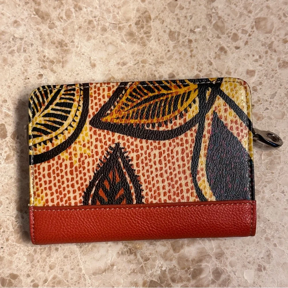 Relic tropical clutch wallet